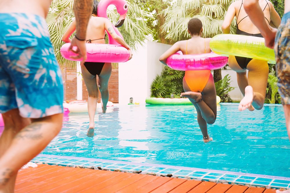 Closeup of diverse people jumping down to the pool