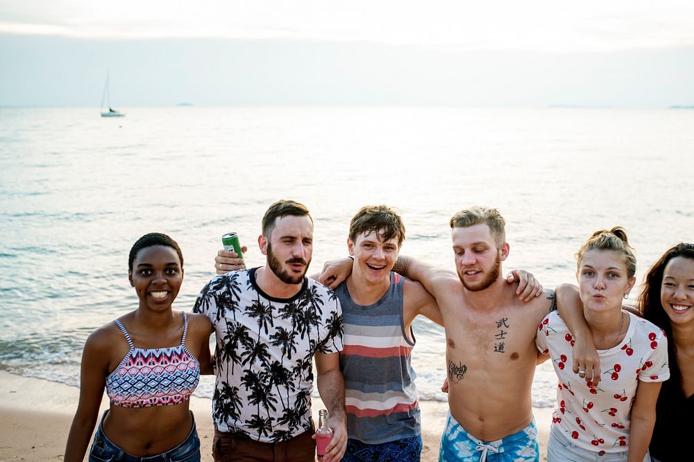 Group of diverse friends at the beach together