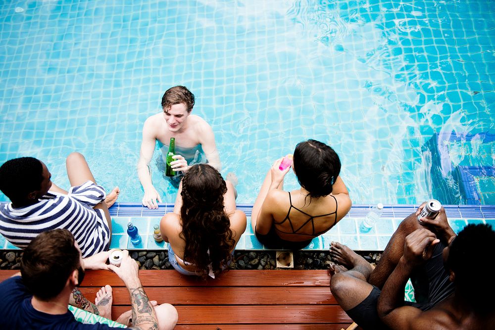 Group of diverse friends enjoying the pool