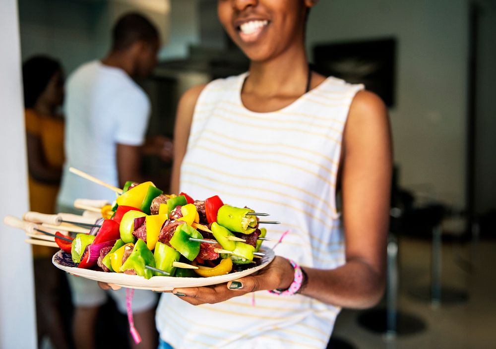 African descent woman with homemade prepared barbecue