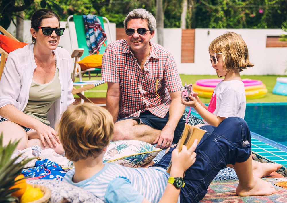 Family leisure by the swimming pool