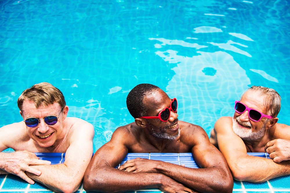 Group of a man with sunglasses in a pool