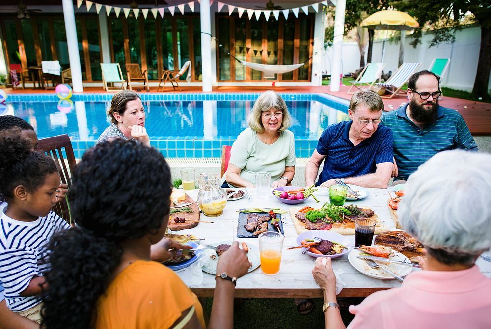 Group of diverse people enjoying barbecue party together