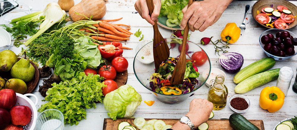 People making a homemade salad