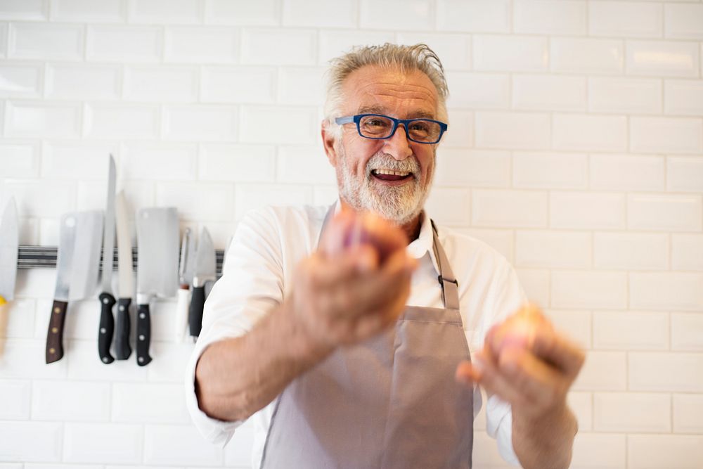 Senior chef with joyful face expression