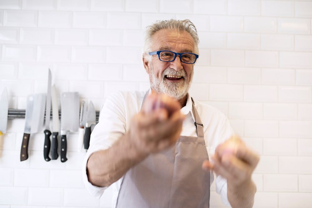 Senior chef with joyful face expression