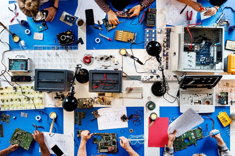 Aerial view of electronics technicians team
