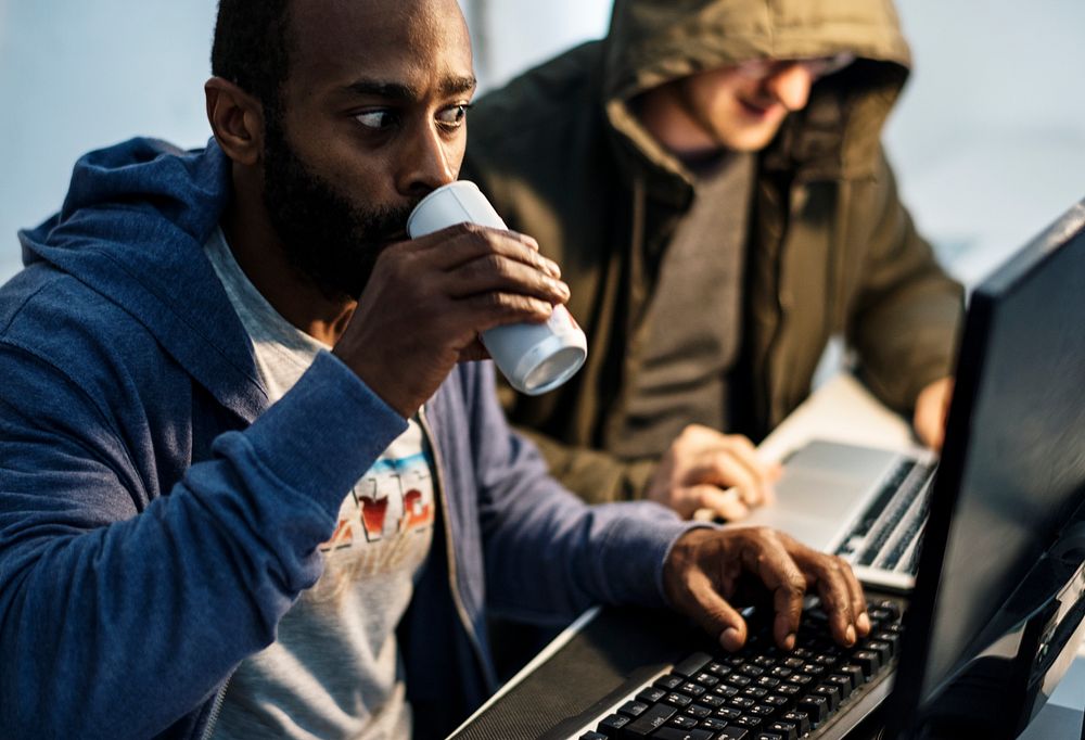 African descent man working with computer laptop