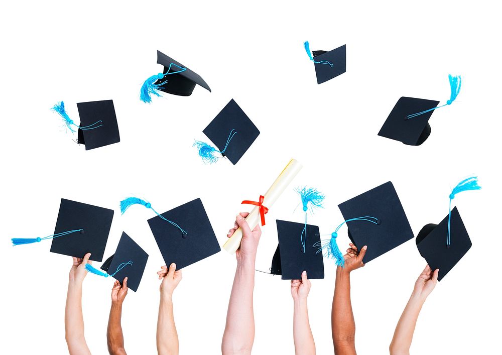 Group of Graduating Student's Hands Holding and Throwing Graduation hats as a Sign of Celebration