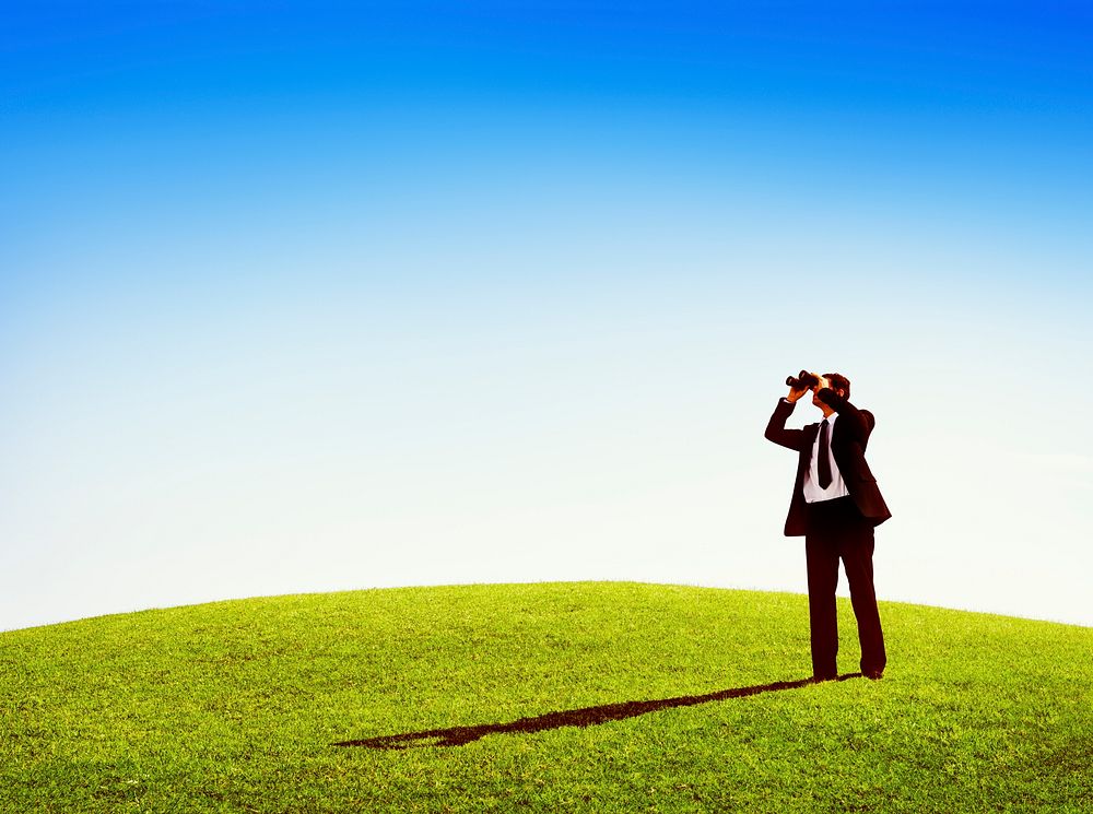 Business man observing nature telescope outdoors Concept