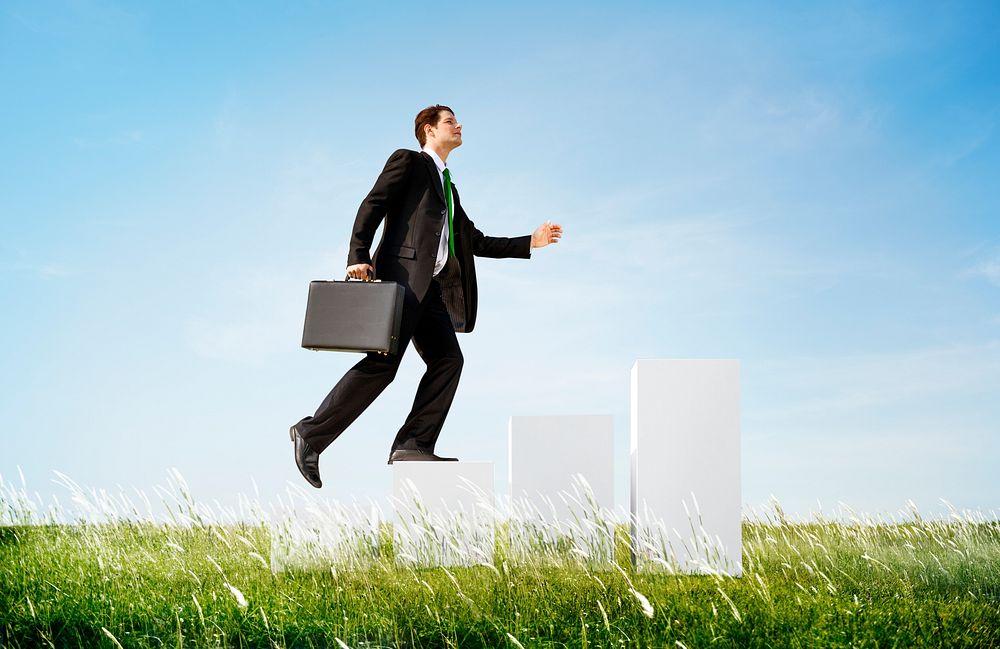 Business Man Climbing Up Steps Outdoors Concept