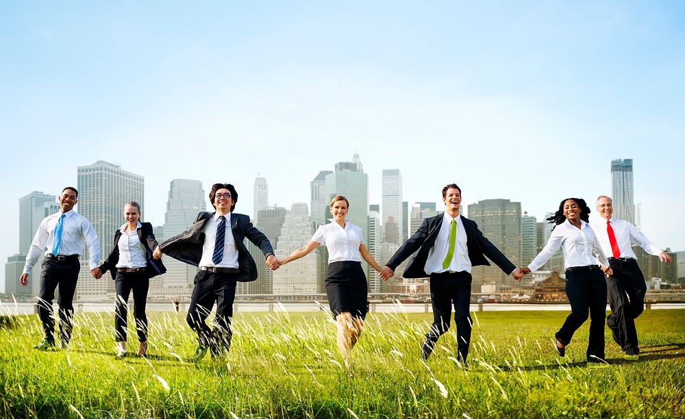 Business People Holding Hands Together Outdoors Concept