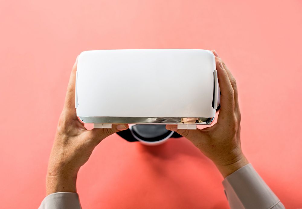 Hands holding VR isolated on background