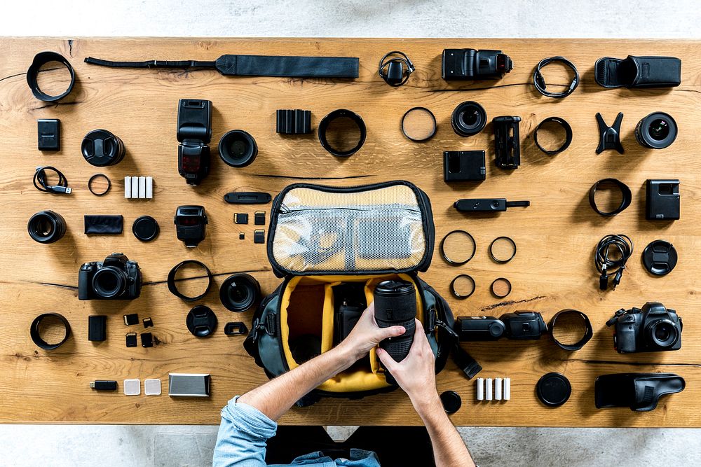 Photographer's kit laid out on the table