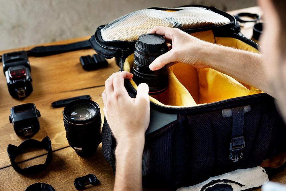 Photographer with camera equipment