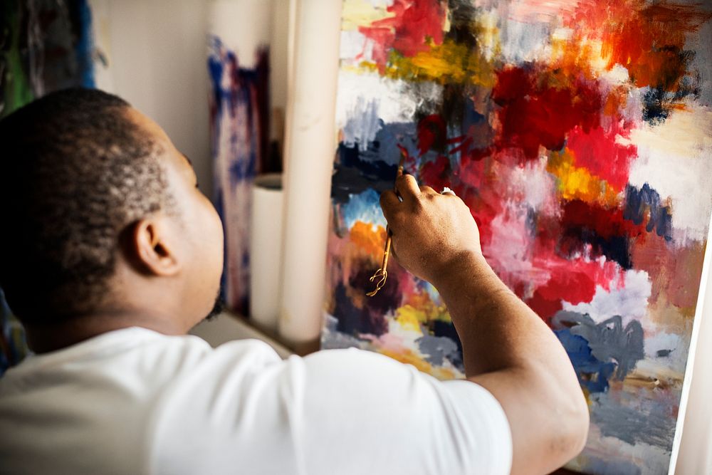 Black artist man doing his art work