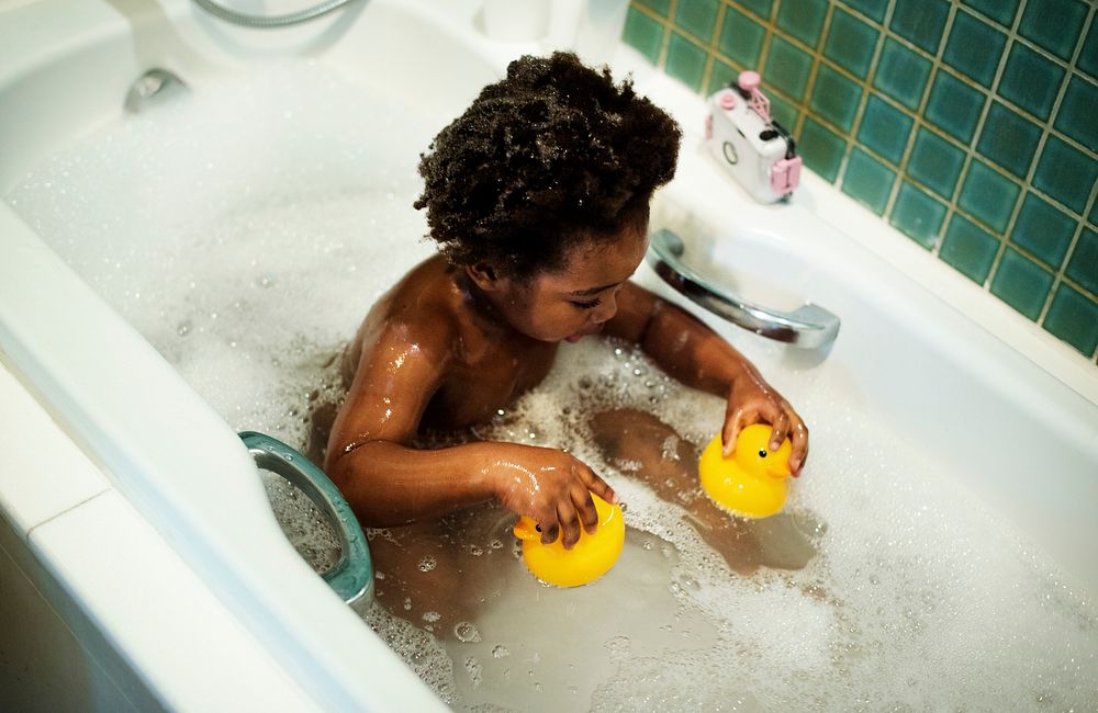 African descent kid bathing