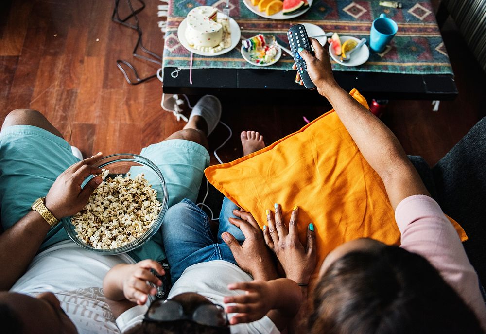 Family eating popcorn