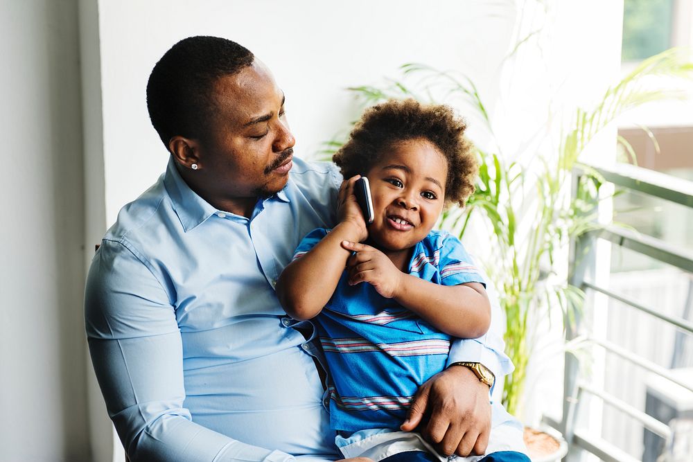 Black father enjoy precious time with his child together happiness