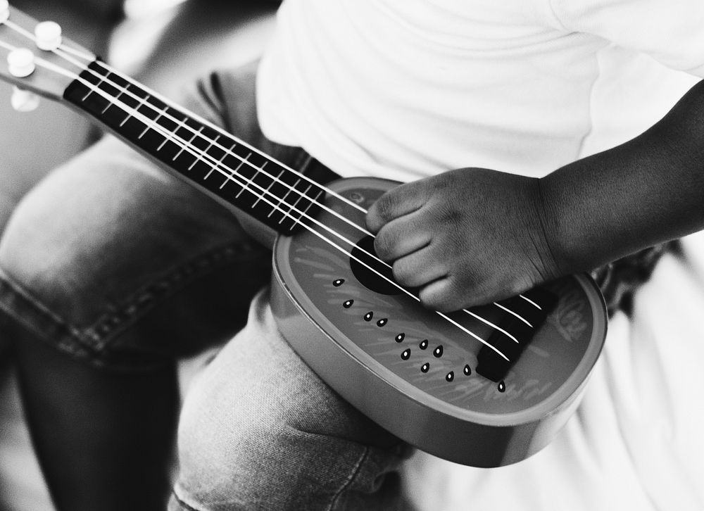 Closeup of hand with ukulele music instrument