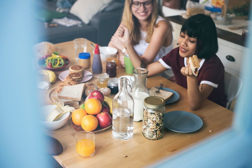 A group of diverse women having breakfast together