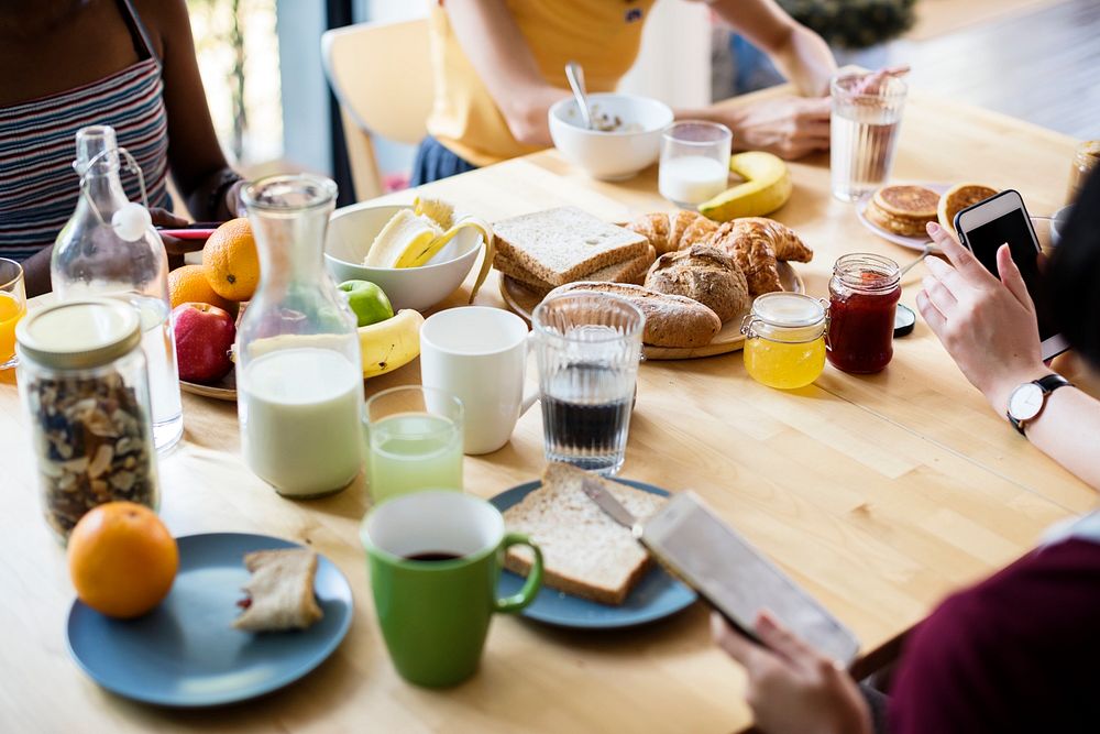 A group of diverse women having breakfast together
