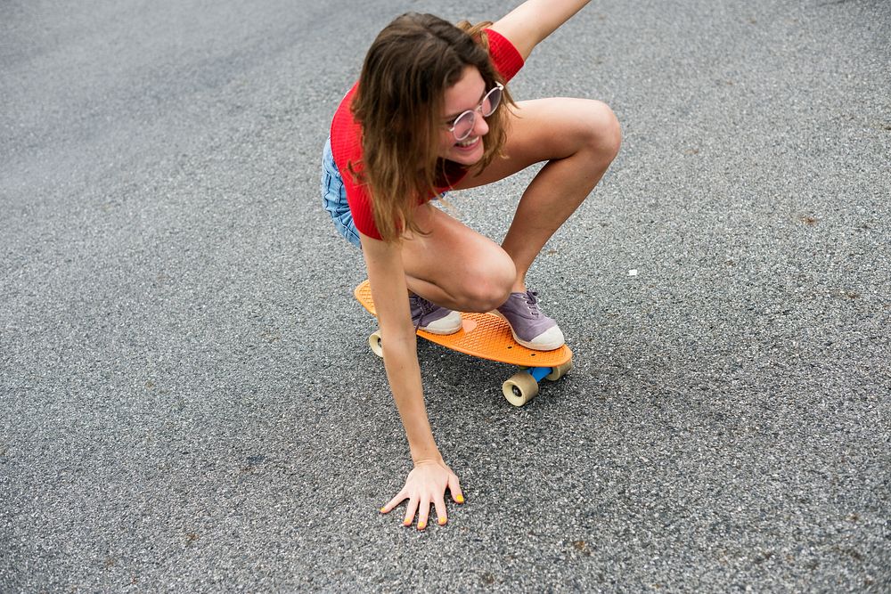 Closeup of caucasian woman enjoying sketeboard