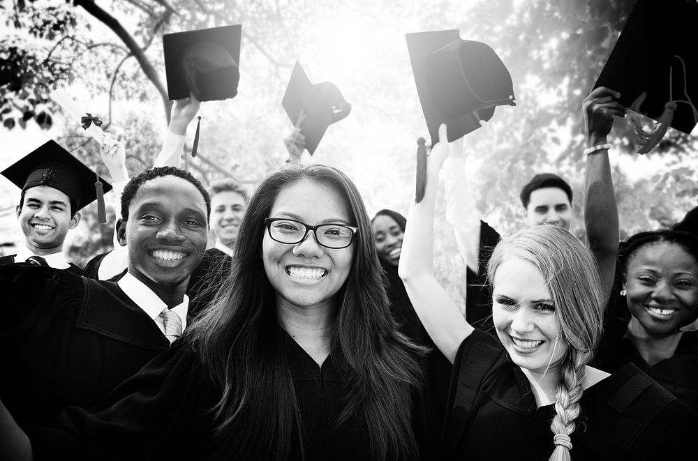 Greyscale diverse group of students graduating