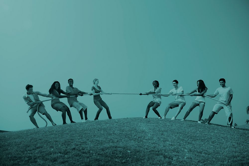 Group Casual People Playing Tug War Concept
