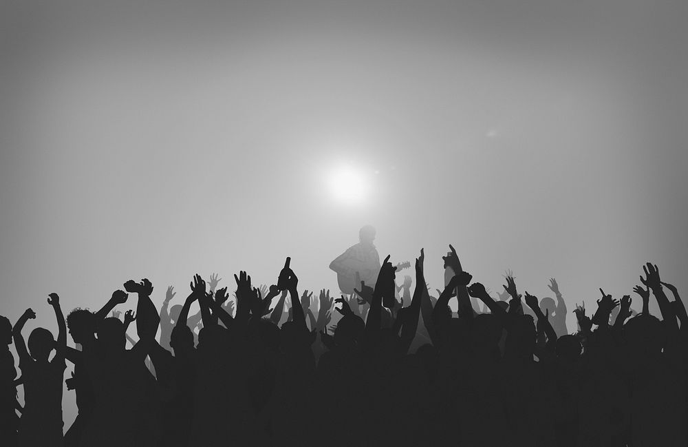 Silhouette of a crowd at an outdoor festival