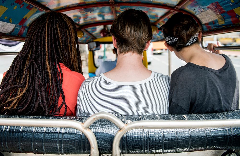 Group of tourists enjoying a tuk tuk ride