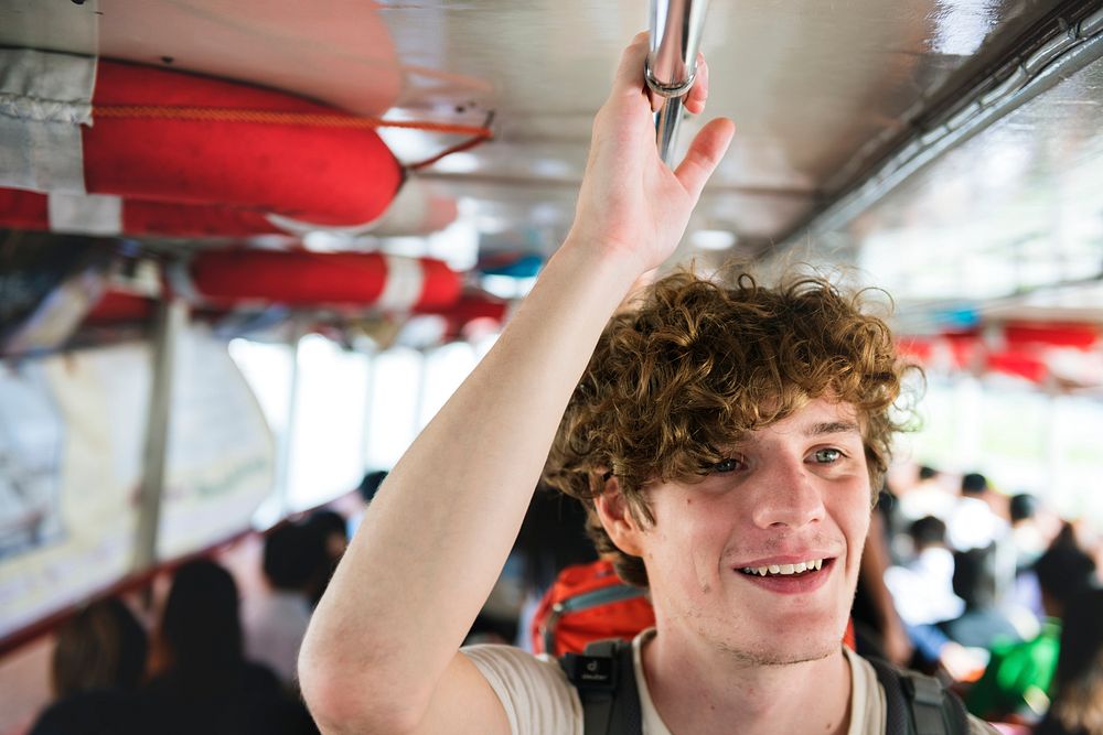 Closeup of caucasian tourist man enjoy boat ride