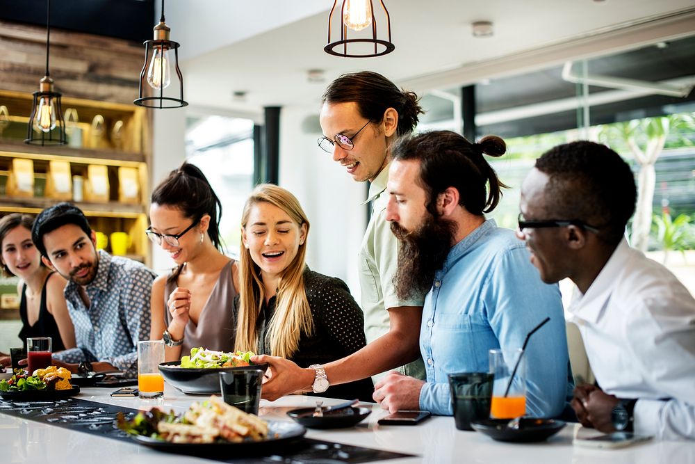 Group of friends eating together