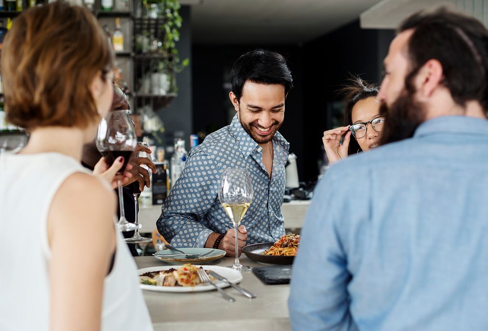 People having meal together in the restaurant