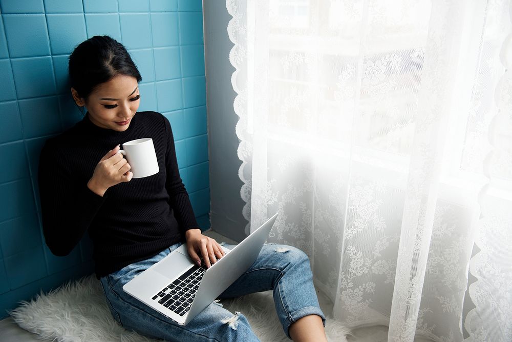 Asian woman using computer laptop