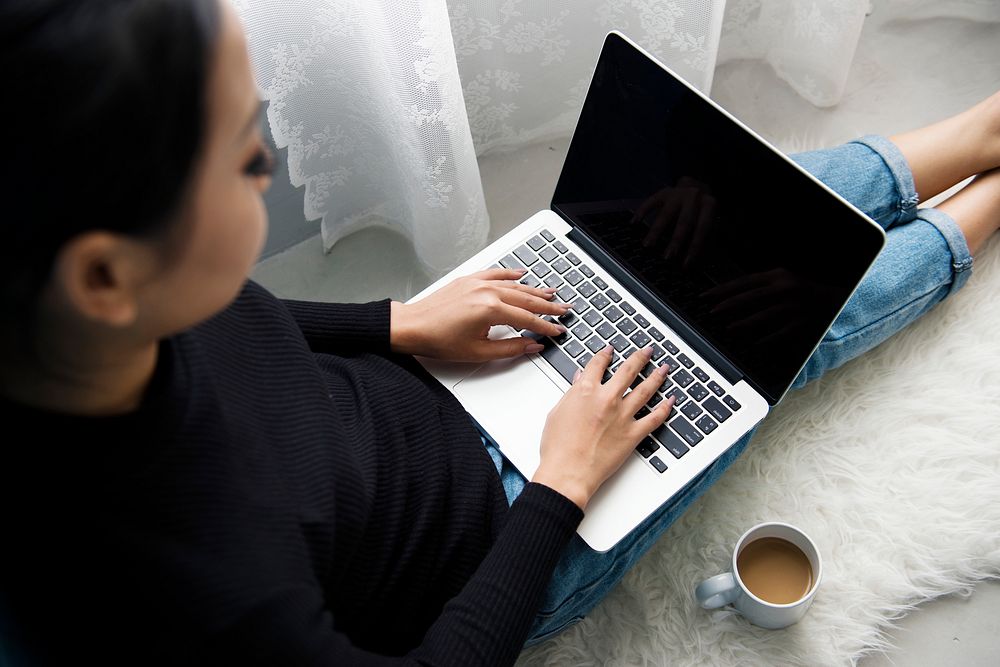 Asian woman using computer laptop