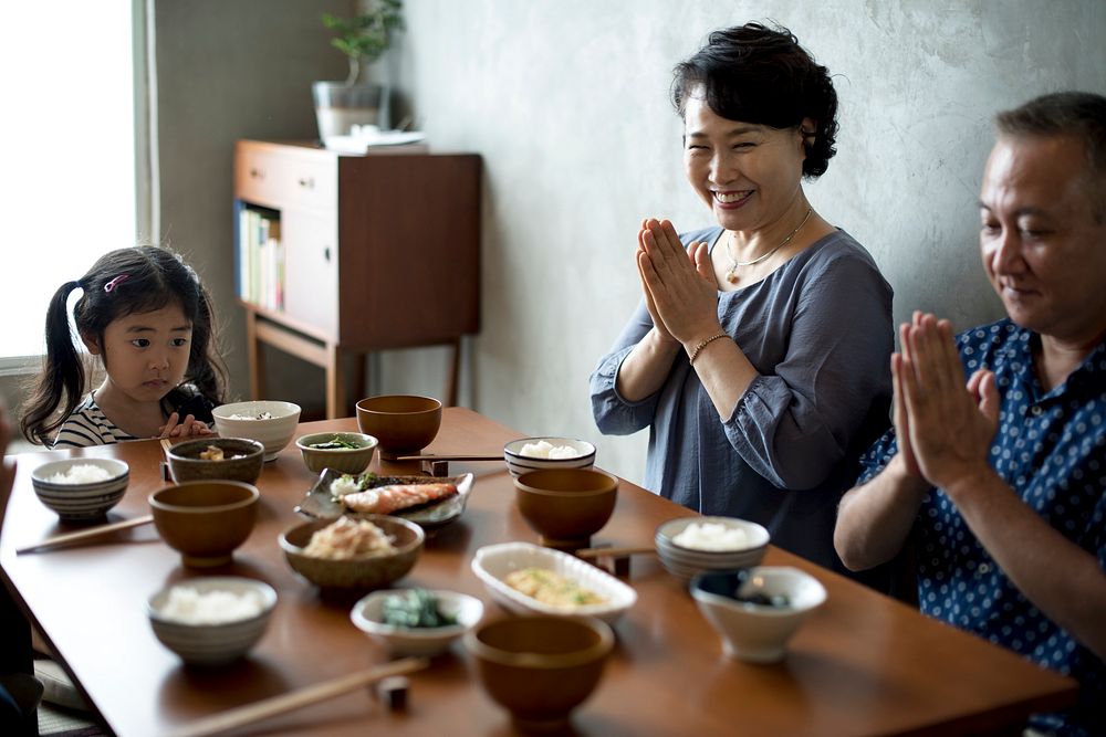 Japanese family praying together