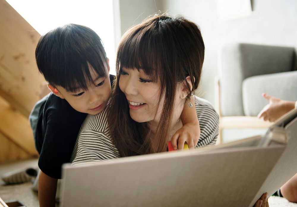Japanese mother and son playing