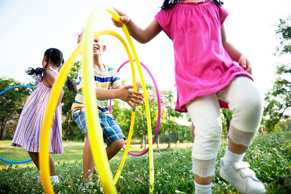 Group of diverse kids playing in the park