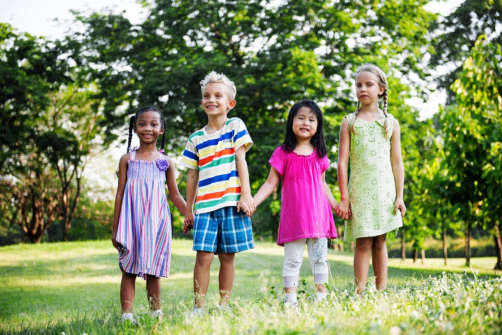 Group of diverse kids playing in the park