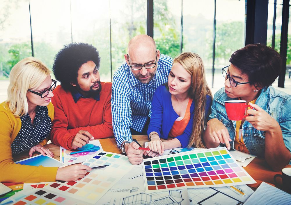 Designers Working and Brainstorming in a Meeting Concept