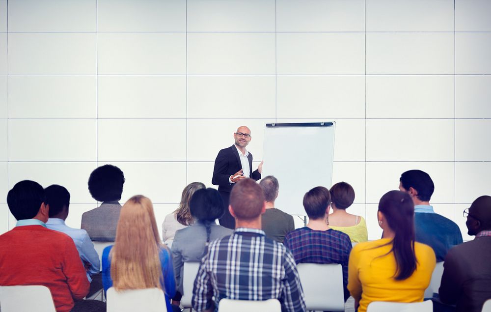 Businessman Presenting in Front of Audience