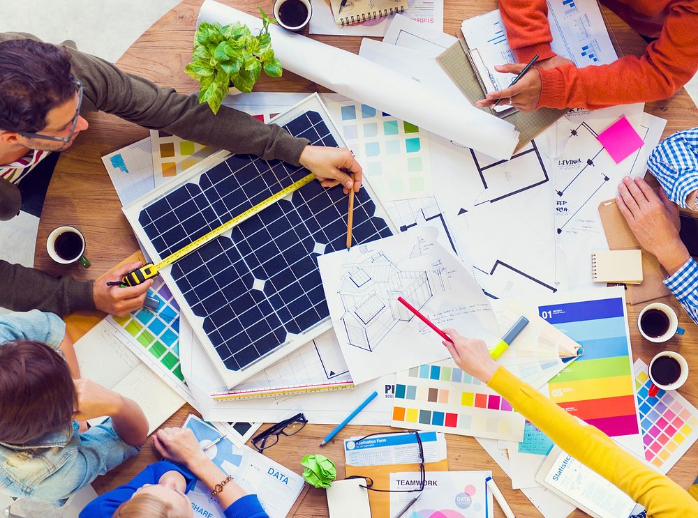 Group Of Architects Planning And Discussing About A Building