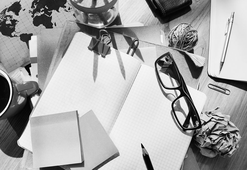 Designer's Desk with Architectural Tools and Notebook