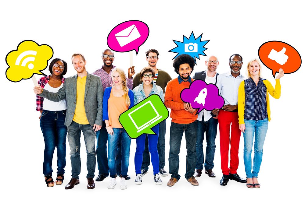 Group of friends holding speech bubbles containing images with social networking theme.