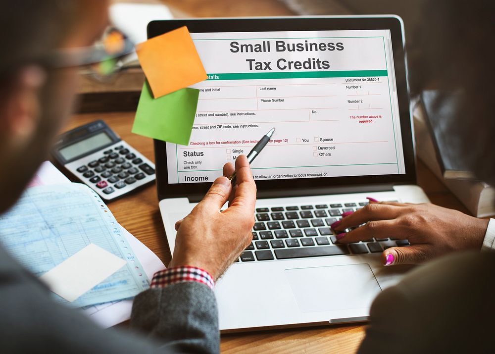Small Business Tax Credits Claim Return Deduction Refund Concept