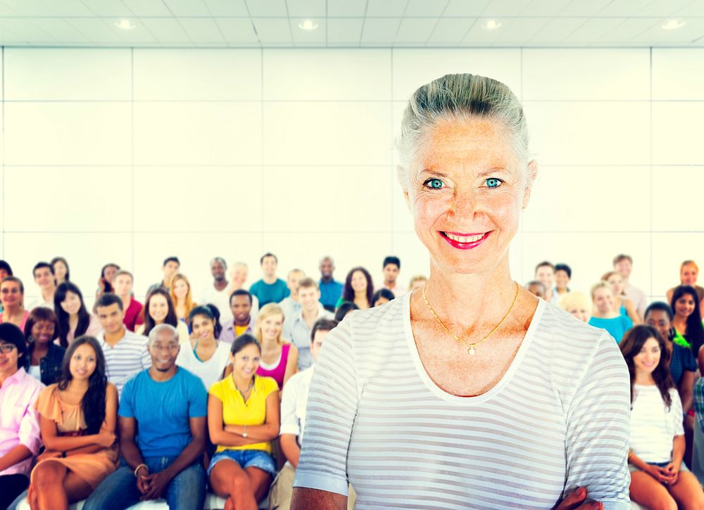 Teacher and large group of student in Lecture room