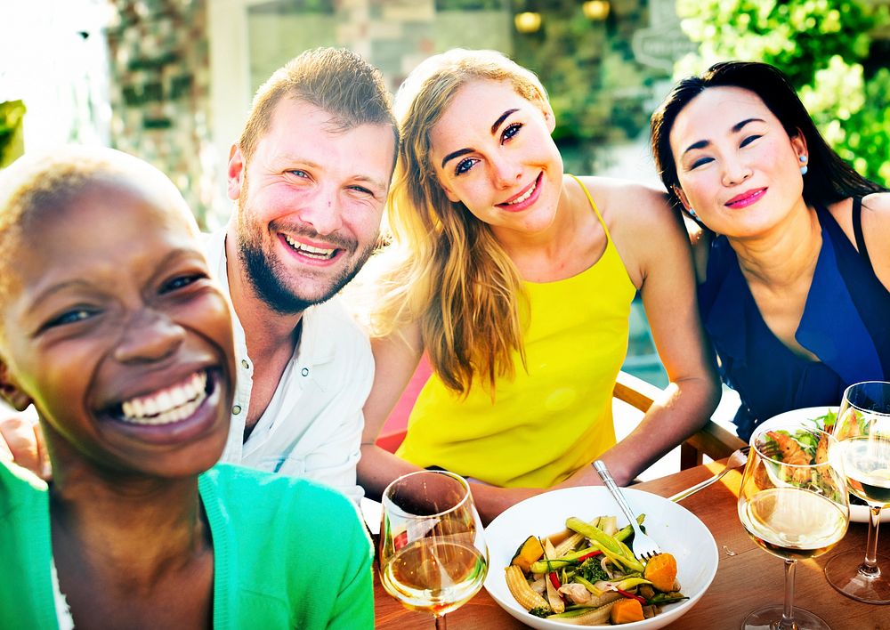 Group of friends having a yard party