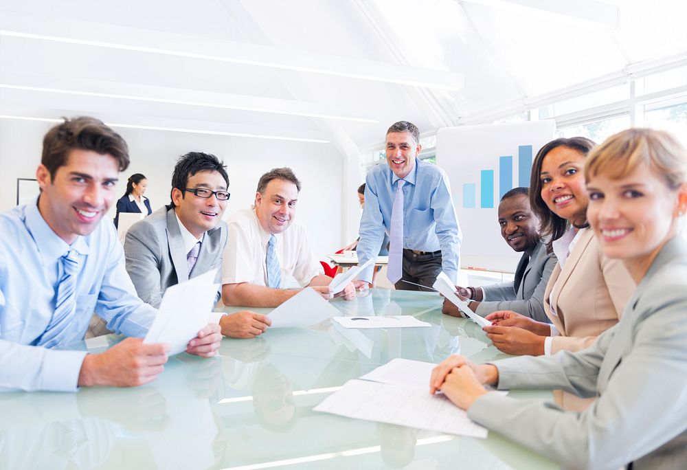 Group of Multi Ethnic Cheerful Corporate People Having a Business Meeting