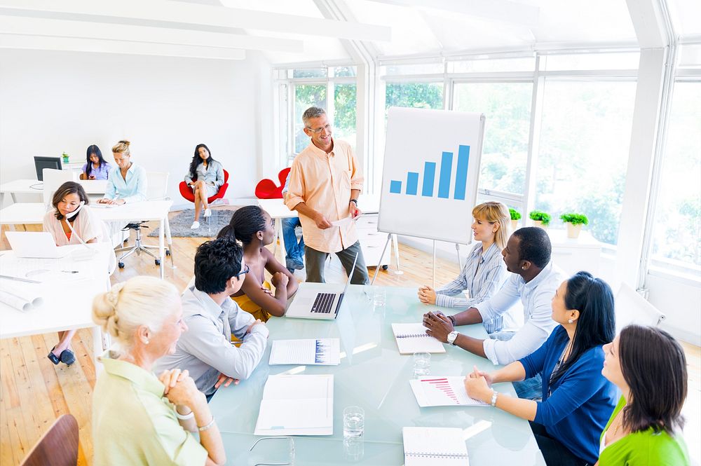 Group of Business People having a Meeting in their Office